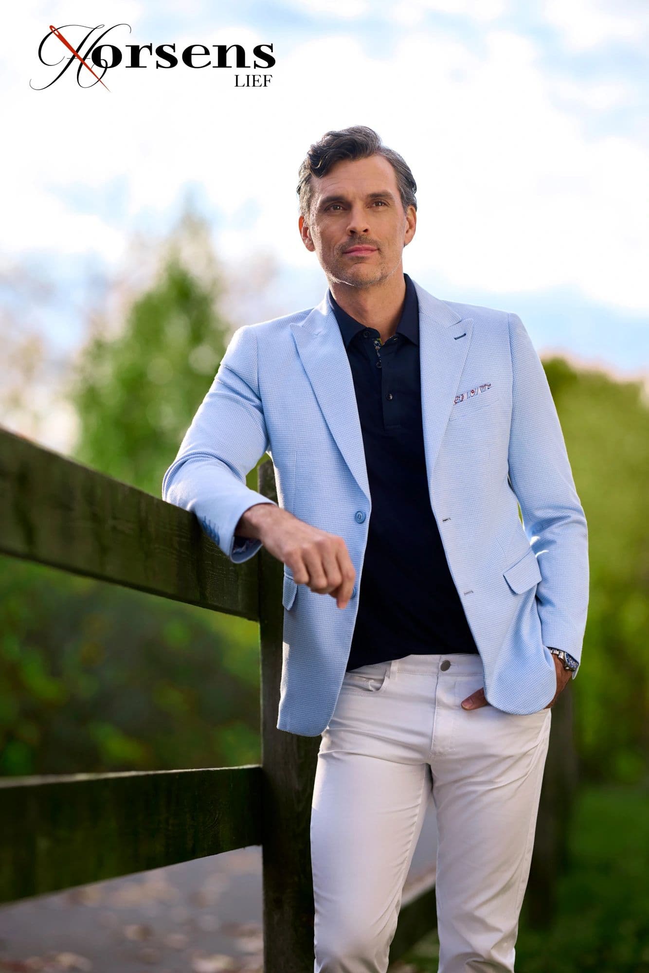 Powder blue blazer with a navy polo